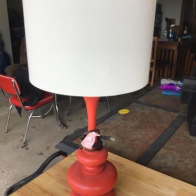 #gar32. Reddish orange lamp with shade