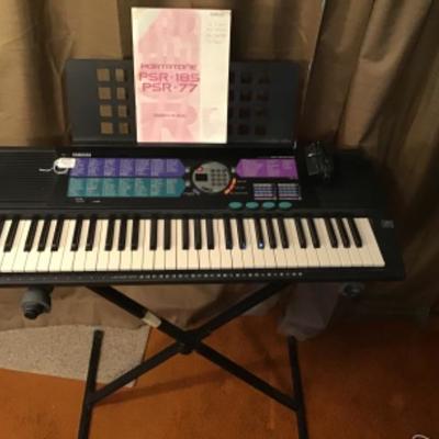 #fr35.  Yamaha keyboard with stand