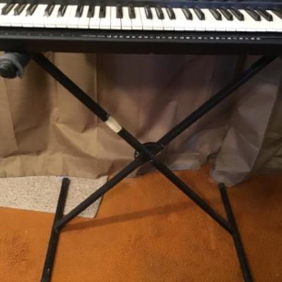 #fr35.  Yamaha keyboard with stand