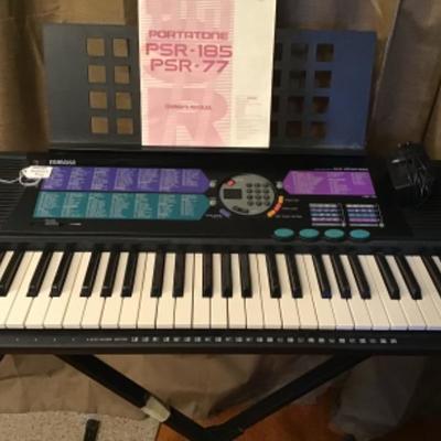 #fr35.  Yamaha keyboard with stand