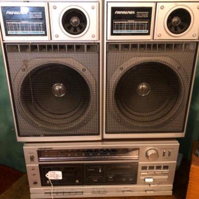 #fr43.  Vintage sounddesign stereo with headphones