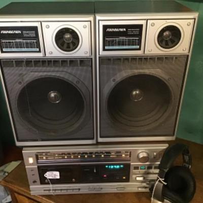 #fr43.  Vintage sounddesign stereo with headphones