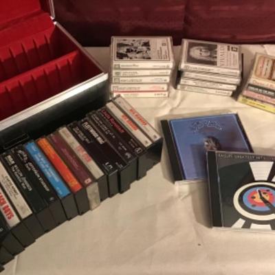 #fr67.  Cassettes with case and Eagles CD