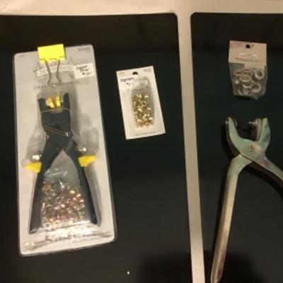 #p10.  Two eyelet pliers, supplies, two black metal sheets