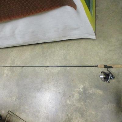 Lot 235 - Fishing Pole With Reel 