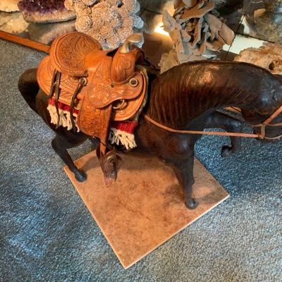 Horse sculpture with leather saddle 