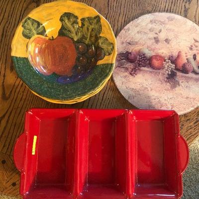 Lot of kitchen Serving Dishes Plates in shades of red
