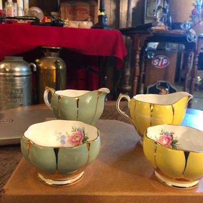 2 sets of cream and sugar