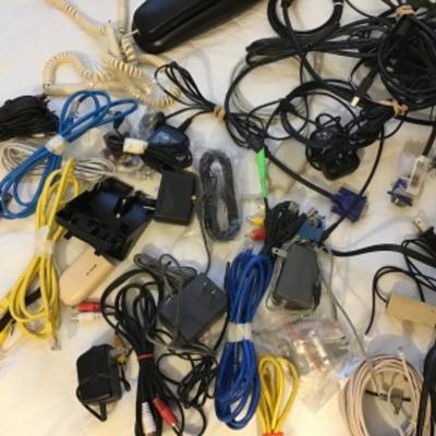 #dbr5.  Assortment of power cords, phone, computer parts