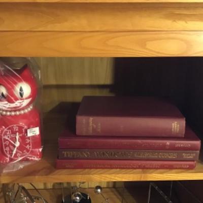 #dbr69.  Cat clock and four books
