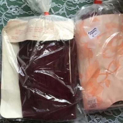 #mb29.  Two burgundy tights two XL, two 48DD bras, for control top +2 nylons
