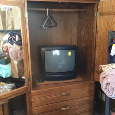 #mb52.  Oak armoire and RCA TV