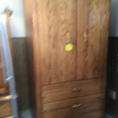 #mb52.  Oak armoire and RCA TV