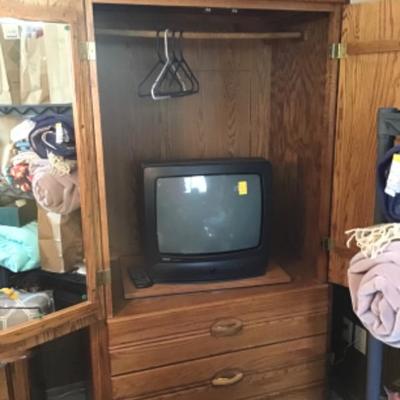 #mb52.  Oak armoire and RCA TV