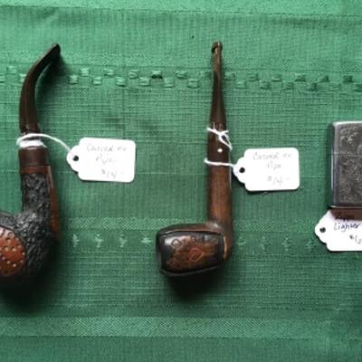 #mb55.   Two pipes and zippo lighter