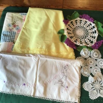 #gb29.  60 x 80 flowered table cloth, 44 inch round vintage lace edge table cloth, vintage runner and doilies