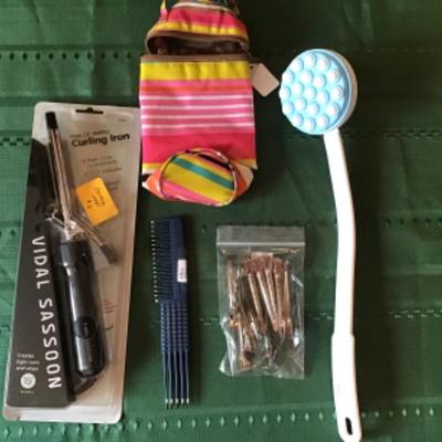 #gb35.  Curling iron, make up bag, hair clips and miscellaneous