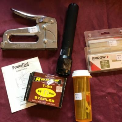 #tr55.  Staple gun, staples, Brad Nails, flashlight