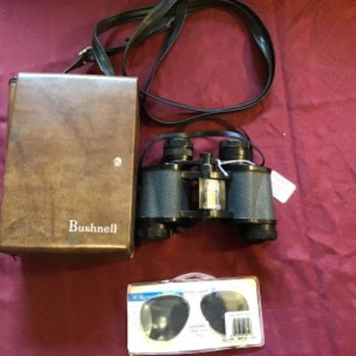 #tr63.  Bushnell 8 x 30 binoculars with glass clip-ons