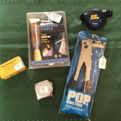 #a36.  Pop rivet tool, pipe heating cable drill pump and miscellaneous