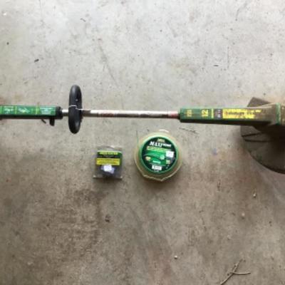 #a55.  Weed eater and stream, spare spool