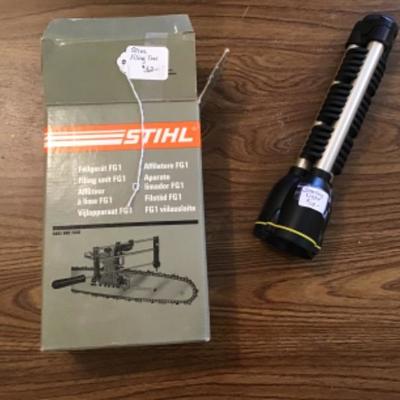 #a70.  Stihl chainsaw filing tool and Stanley flashlight