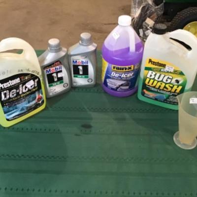 #a72.  2 quarts of oil, pork hand and partial jugs