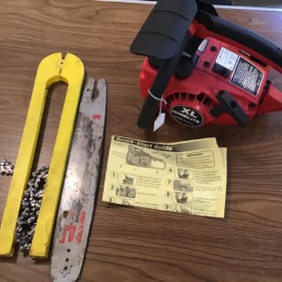 #a74.  Homelite XL chainsaw