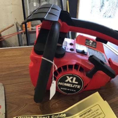 #a74.  Homelite XL chainsaw