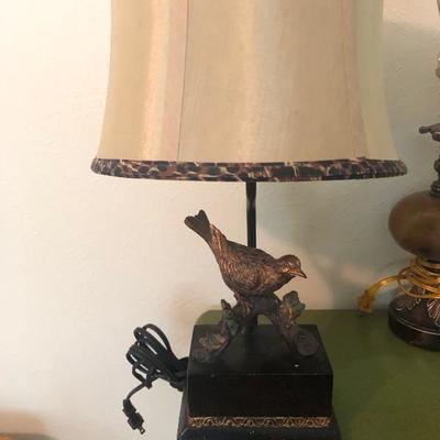 Table lamp with bird figure