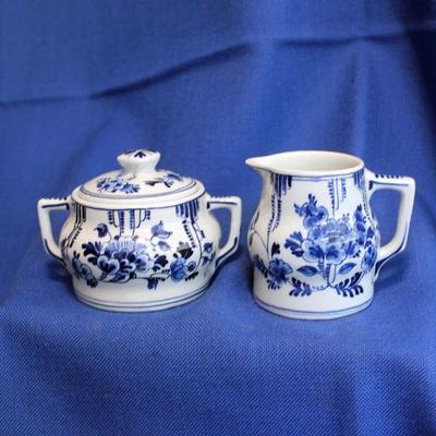 Lot 242: Delft Sugar and Creamer  $20
