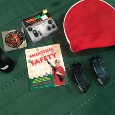 #a102.  Red case, tru glow light, two Eagle ammo clips (for air soft??)