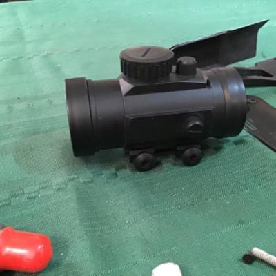 #a108.  Gun parts and pieces, scope