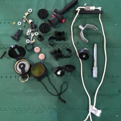 #a109.  Engineer compass, miscellaneous gun parts and pieces