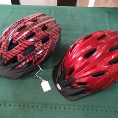 #a113.  Two bike helmets