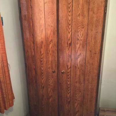 #a114.  Storage cabinet-contents not included