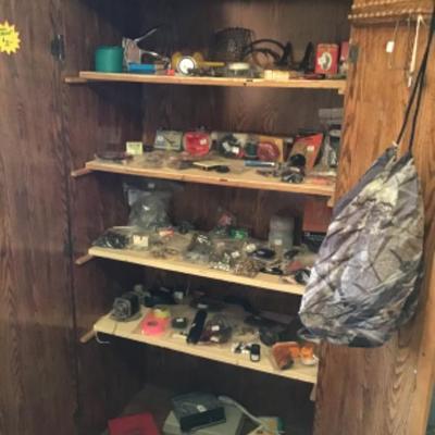 #a114.  Storage cabinet-contents not included
