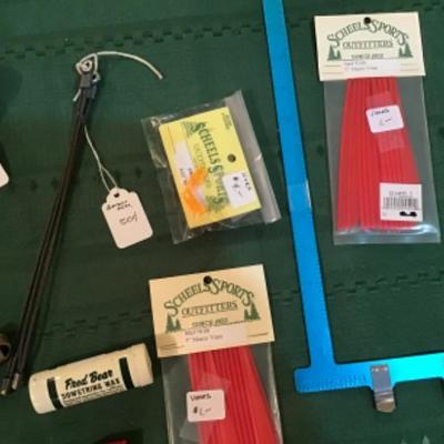 #a137.  Archery package-glove, vanes, hoya filter, miscellaneous
