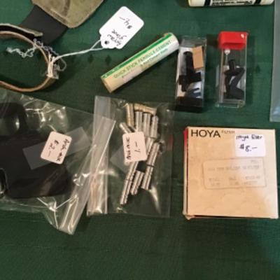 #a137.  Archery package-glove, vanes, hoya filter, miscellaneous