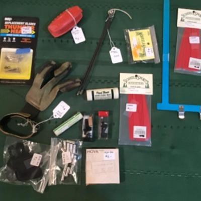 #a137.  Archery package-glove, vanes, hoya filter, miscellaneous
