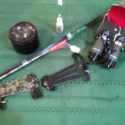 #a138.  Binoculars, arrows, magnifier and miscellaneous