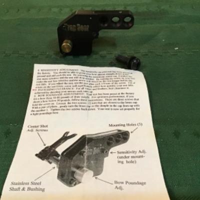 #a140.  Trap door archery rest