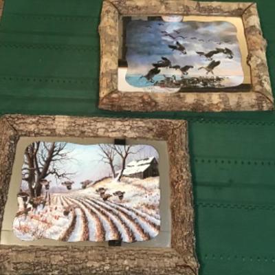 #a142.  Two mirrored pictures with unique tree frames