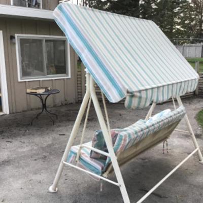 #a146.  Porch swing with canopy
