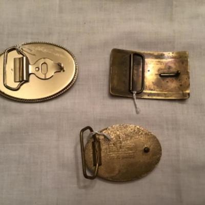 #z1.  Three wildlife belt buckles