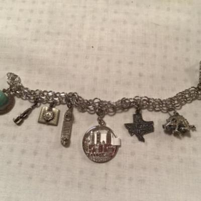 #z46.  Silver charm bracelet