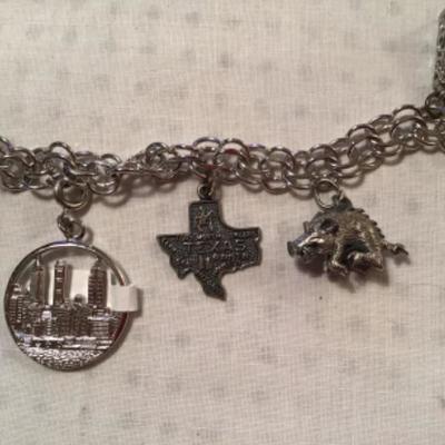 #z46.  Silver charm bracelet