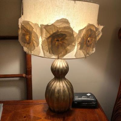 Gilt lamp with floral shade. 