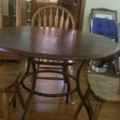 Oak round kitchen table and chairs