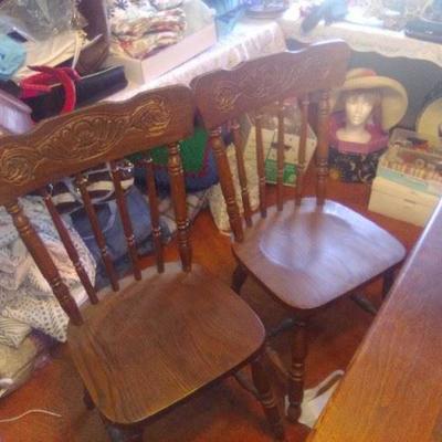 pair of oak press back chairs